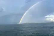 Family attending burial at sea off Carolina Beach aboard the Wild Rover III charter boat